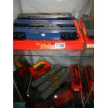 A boxed Tri-ang R445, R446, R447 transcontinental, R 253 Diesel shunter etc., two shelves.