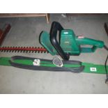 A hedge trimmer etc.