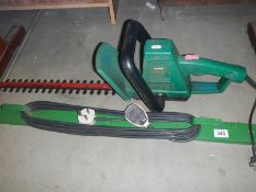 A hedge trimmer etc.