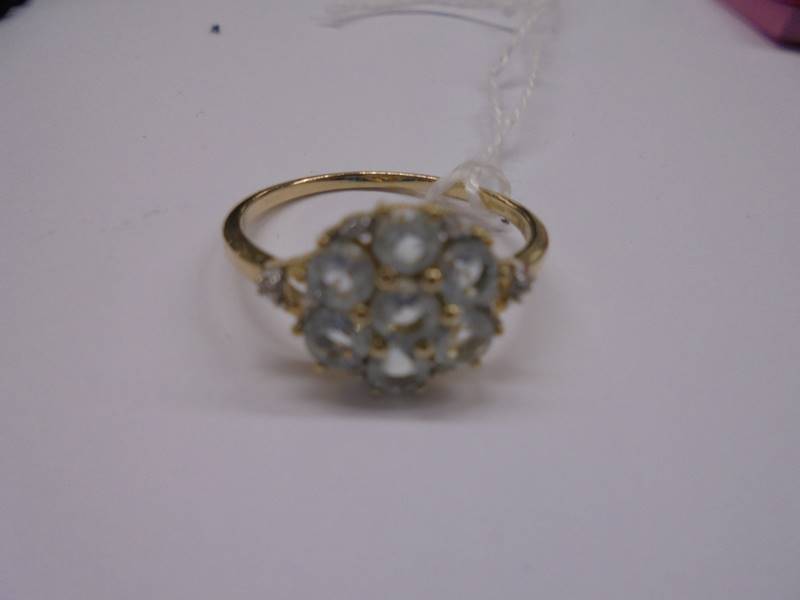 An aquamarine and diamond ring marked 925, size R half, 2.1 grams. - Image 2 of 2