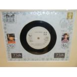 A John Lennon 25th Anniversary, 8 Dec 05, FDC/vinyl 45 record framed set.