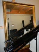 A large gilt framed bevel edged mirror, 114 x 94 cm. COLLECT ONLY.