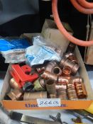A quantity of copper plumbing fittings.