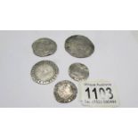 Five antique silver coins including Elizabeth I and Charles I.