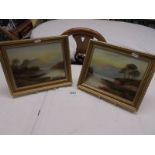 A pair of gilt framed oil paintings of rural scenes signed H Binton?, 27 x 22 cm.
