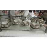 Twenty pieces of Japanese fine porcelain hand painted tea ware.