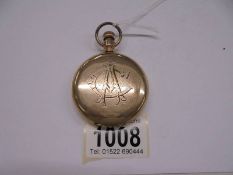 A gold plated monogrammed full hunter pocket watch.