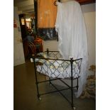 A Victorian iron baby crib with brass fitting. COLLECT ONLY.