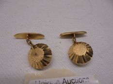 A pair of gold 'Russian' cuff links, marked 25, test as 18ct gold. 5.6 grams.