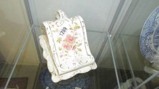 A Victorian floral decorated cheese dish.