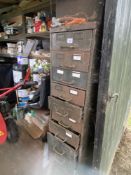 A steel cabinet with drawers, part filled with various ironmongery. Collect Only.