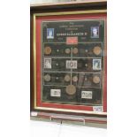 A framed and glazed 'The Golden Anniversary of Queen Elizabeth II' coin and stamp collage.