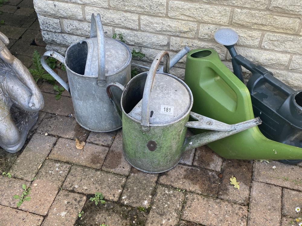 2 galvenised steel watering cans and 2 plastic. Collect Only.