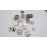 A mixed lot of Indian silver coins. Approximately 140 grams.