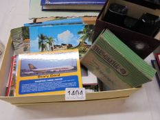 A mixed lot of postcards and a Viewmaster viewer.