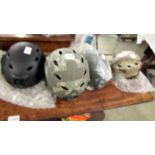 Four Tactical Airsoft paint ball helmets, new and unused.