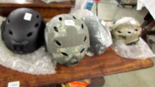 Four Tactical Airsoft paint ball helmets, new and unused.
