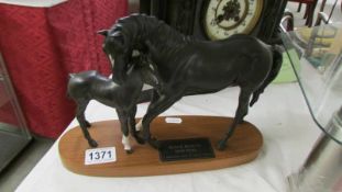 A Royal Doulton Black Beauty with foal.