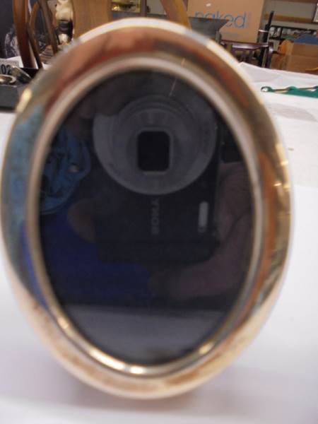 Two small oval silver photo frames. - Image 2 of 3
