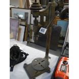 An antique table drill.