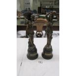 A pair of art deco spelter figure, 30 cm tall.