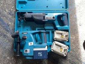 A Makita 24V hammer drill and reciprocated saw and 3 batteries. Collect Only.