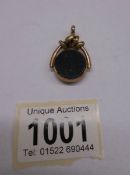 An un-marked Victorian double sided watch fob.
