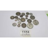 A small collection of silver coins, 86.5 grams.