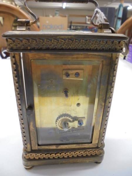 A brass carriage clock with key. - Image 3 of 4