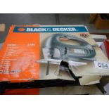 A Black and Decker jig saw.