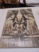 A copy of H R Giger's 'Necronomicon'.