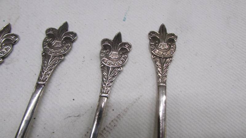 Six Boy Scout spoons, one other and a pair of silver plate salts with blue glass liners. - Image 2 of 3