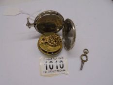 A silver chain driven pocket watch in working order.