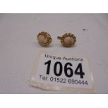 A pair of 18ct gold cameo earrings, total weight 4.2 grams.