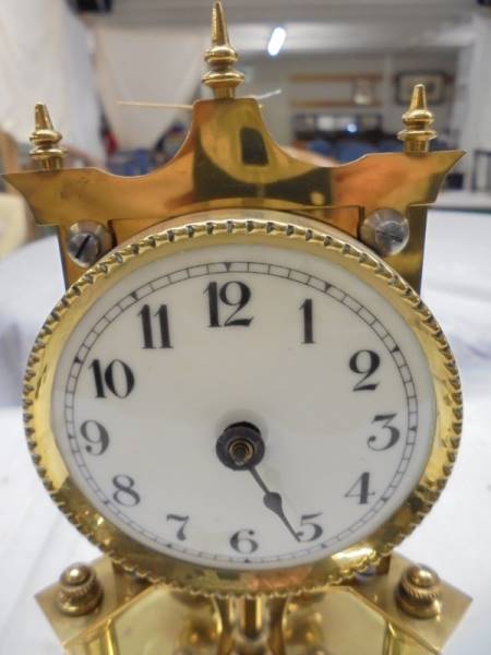 A 1905 400 day Torsion clock by Jaurensuren Fabric under glass dome. - Image 4 of 4