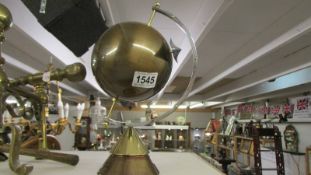 A Breitling shop display globe.