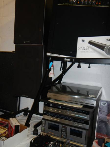 A Hitachi Hi-Fi seperates system with speakers and stands including instructions, leads