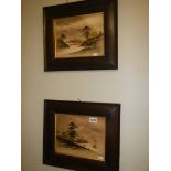 A pair of early 20th century oak framed Japanese painting with gilt overlay of Mount Fiji.