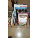 A selection of railway books, DVD's, game and Steam Locomotive Nanoblock kit.