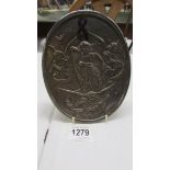 A small oval silver plate plaque marked W H & S 1889.