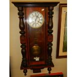 A Victorian mahogany wall clock. COLLECT ONLY.