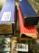 Four boxed Hornby coaches.