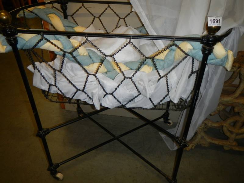 A Victorian iron baby crib with brass fitting. COLLECT ONLY. - Image 2 of 3