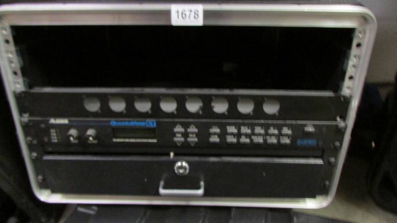 An Alesis rack mount Quanaverb GT guitar effects processor with flight case. COLLECT ONLY