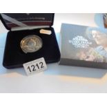 A cased 'The Queen Mother' 1900-2002 silver proof memorial crown with certificate.