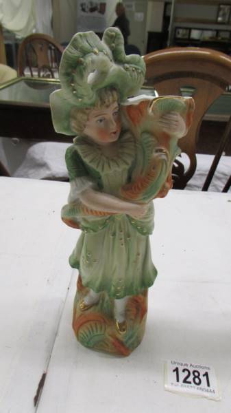 A pair of continental porcelain figural spill vases. 23 cm. - Image 3 of 3