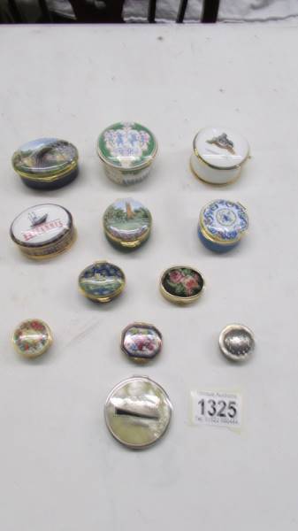 Twelve assorted trinket/pill boxes.