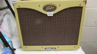 A Peavey Classic 30 watt guitar combo with soft case.