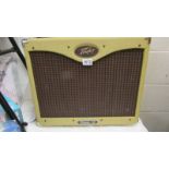 A Peavey Classic 30 watt guitar combo with soft case.