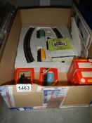 A box of Hornby/Tri-ang boxed goods wagons, signal box etc., and a good train set.